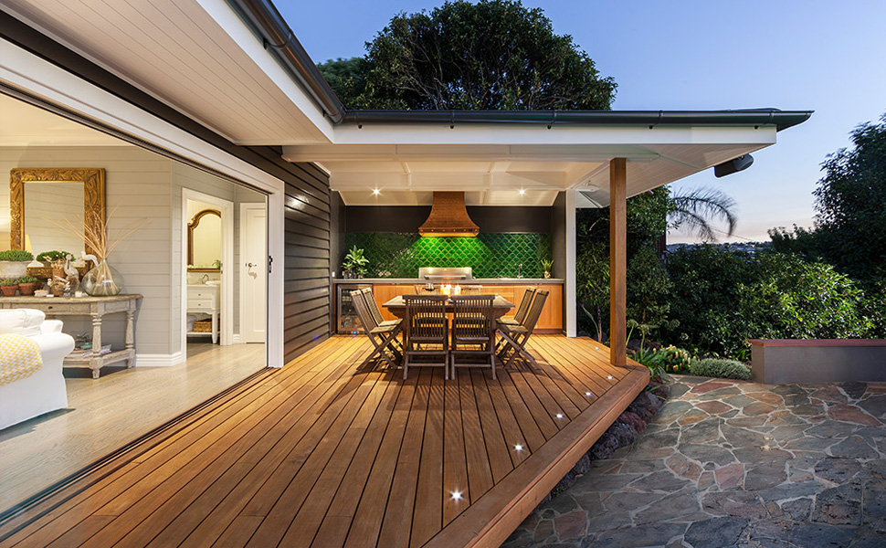 Deck next to garden with outdoor bar